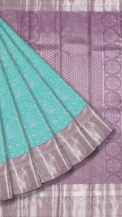 Turquoise Green Kanchi Pattu Silk Saree with Silver Contrast Zari Border