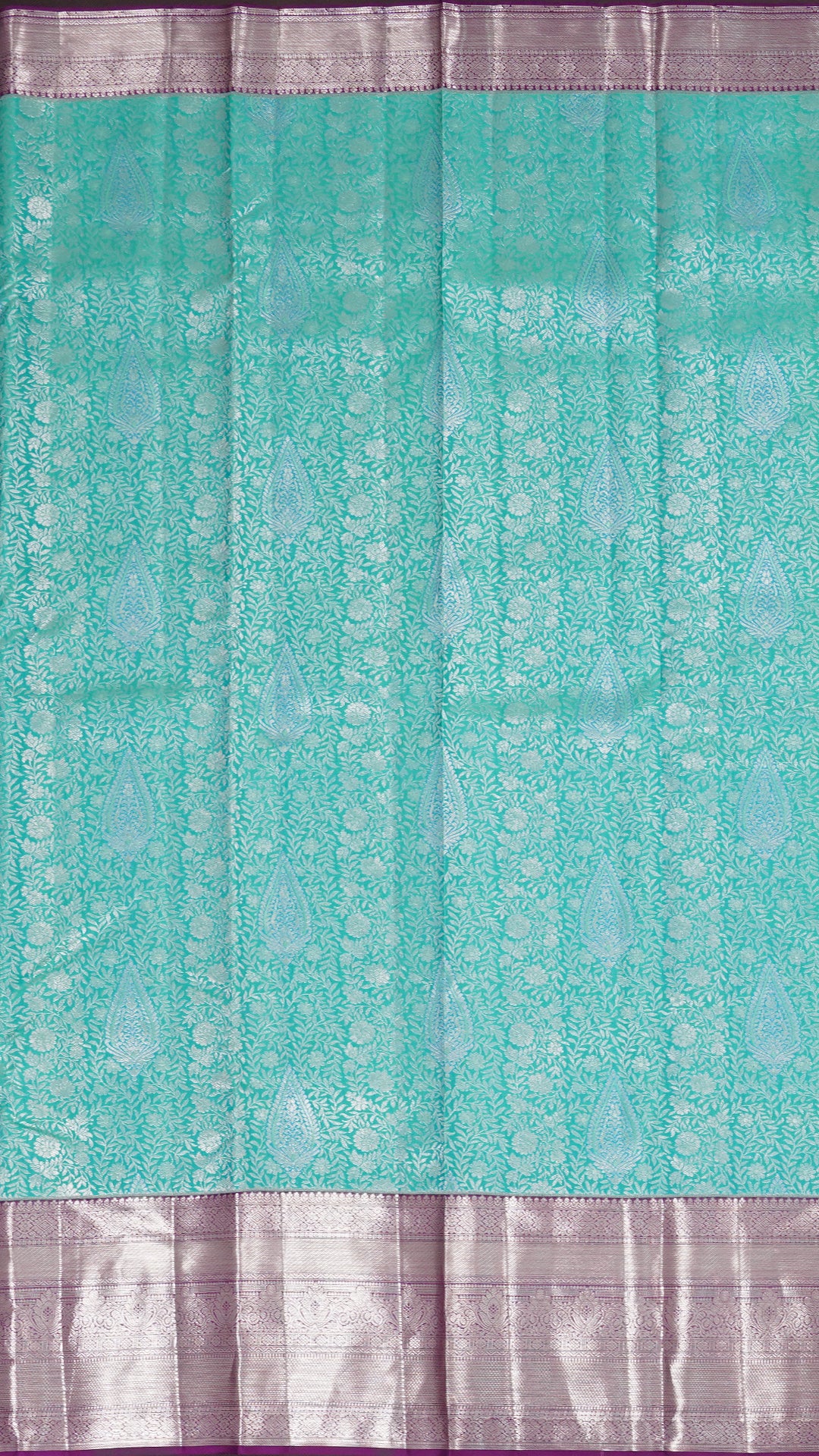 Turquoise Green Kanchi Pattu Silk Saree with Silver Contrast Zari Border