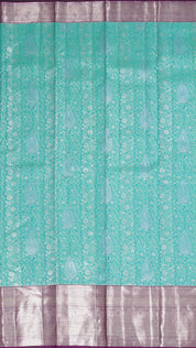 Turquoise Green Kanchi Pattu Silk Saree with Silver Contrast Zari Border
