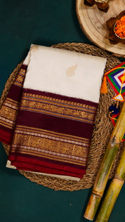 White Ikkath Silk Saree with Burgundy Zari Border