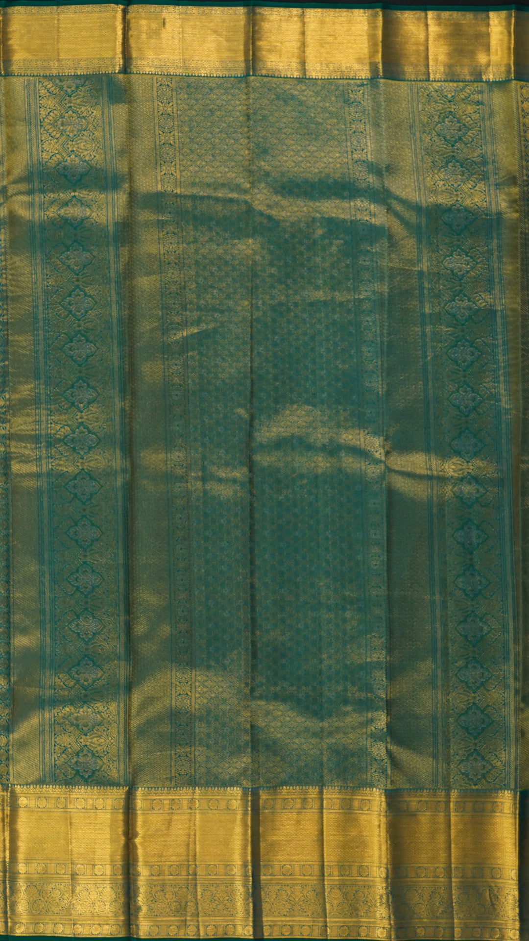 Peach Orange and Green Kanchi Pattu Saree with Zari Elegance