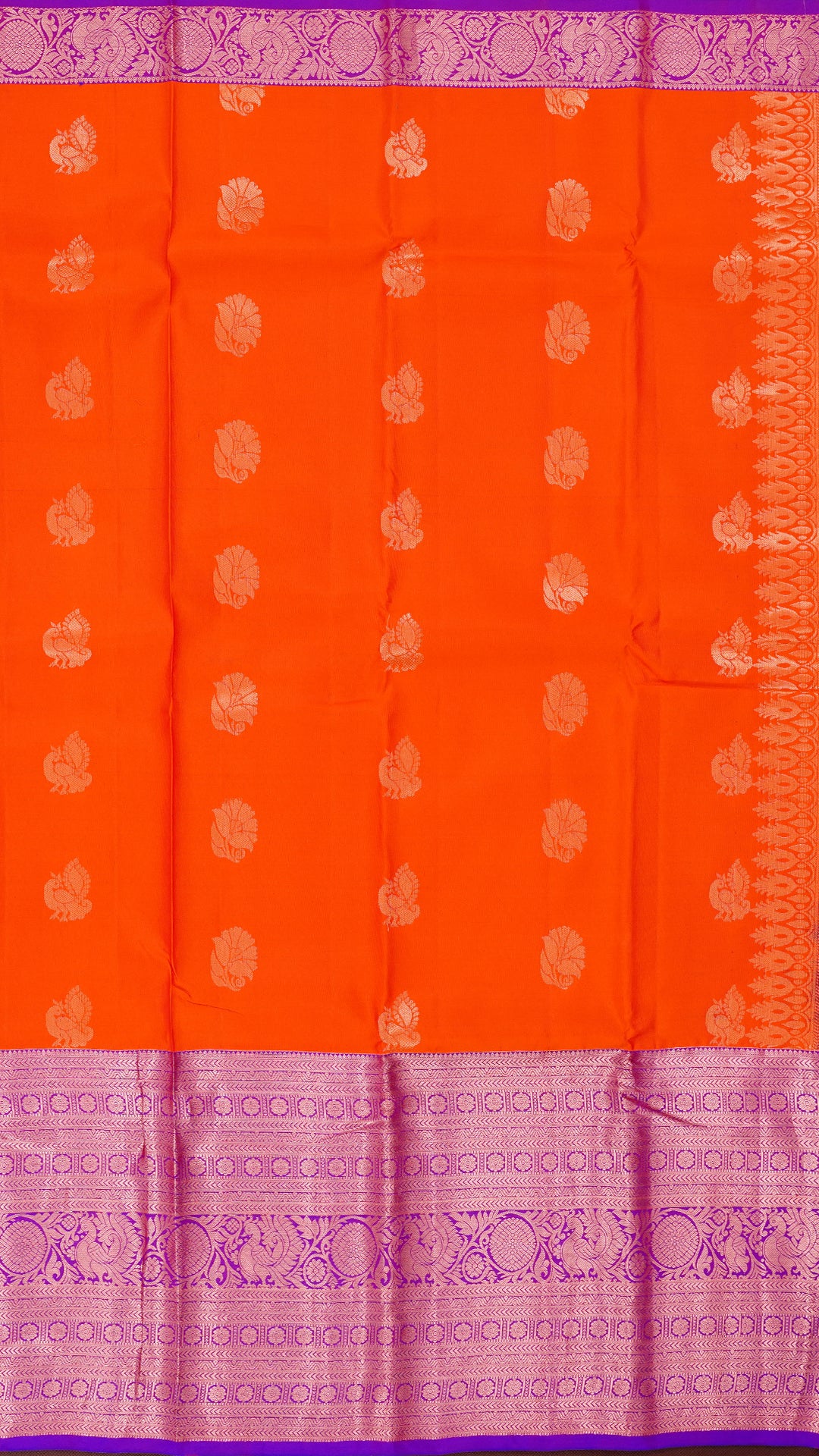 Bright Orange Kanchipuram Saree with Silver Zari Border
