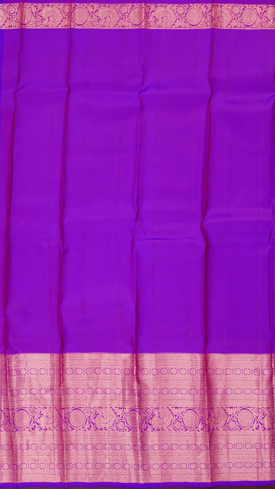 Bright Orange Kanchipuram Saree with Silver Zari Border