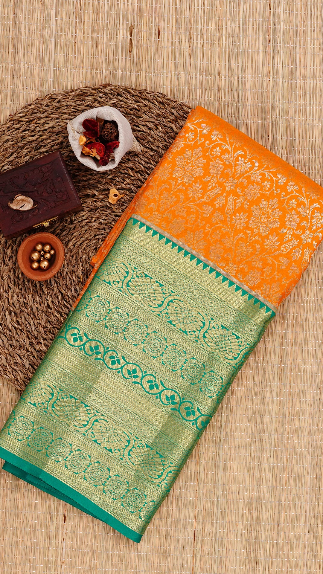 Orange Kanchipuram Saree with Silver Zari Work