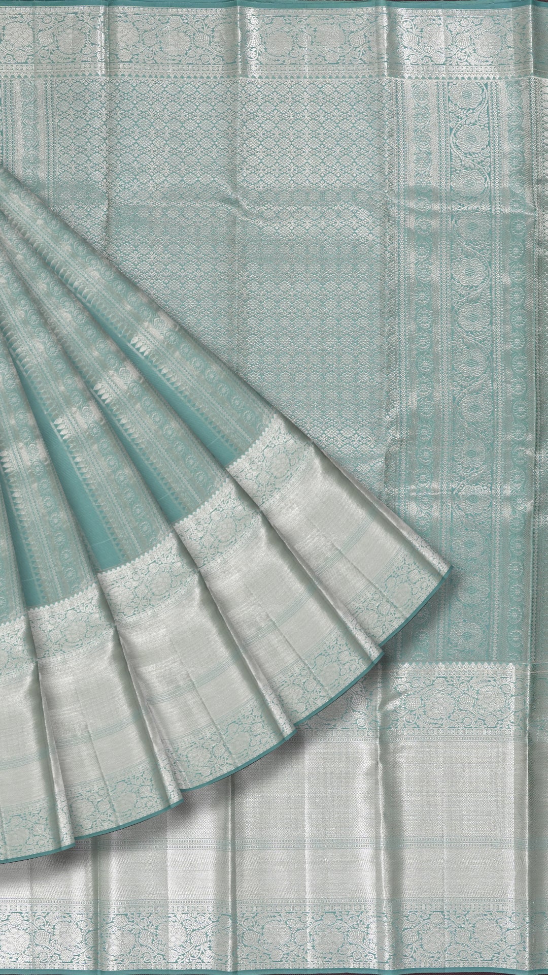 Teal Green Kanchipuram Silk Saree with Silver Butta & Self Border
