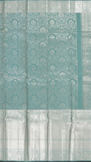 Teal Green Kanchipuram Silk Saree with Silver Butta & Self Border