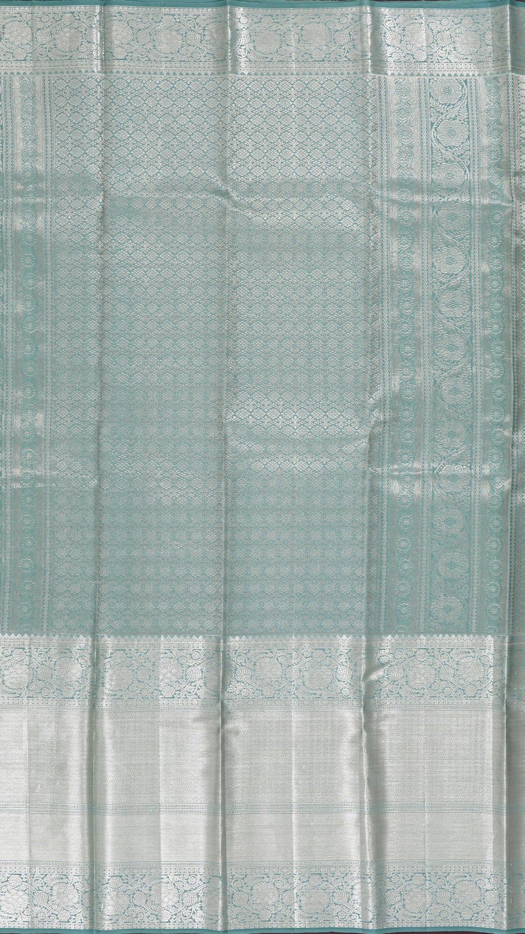 Teal Green Kanchipuram Silk Saree with Silver Butta & Self Border