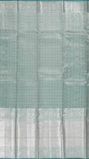 Teal Green Kanchipuram Silk Saree with Silver Butta & Self Border