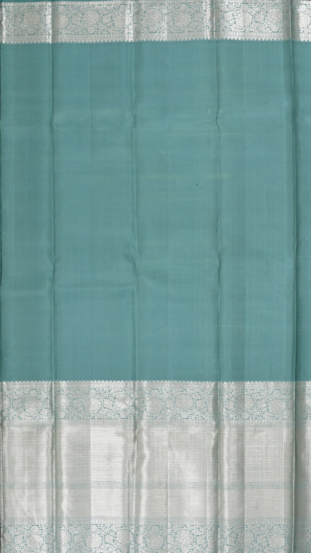 Teal Green Kanchipuram Silk Saree with Silver Butta & Self Border