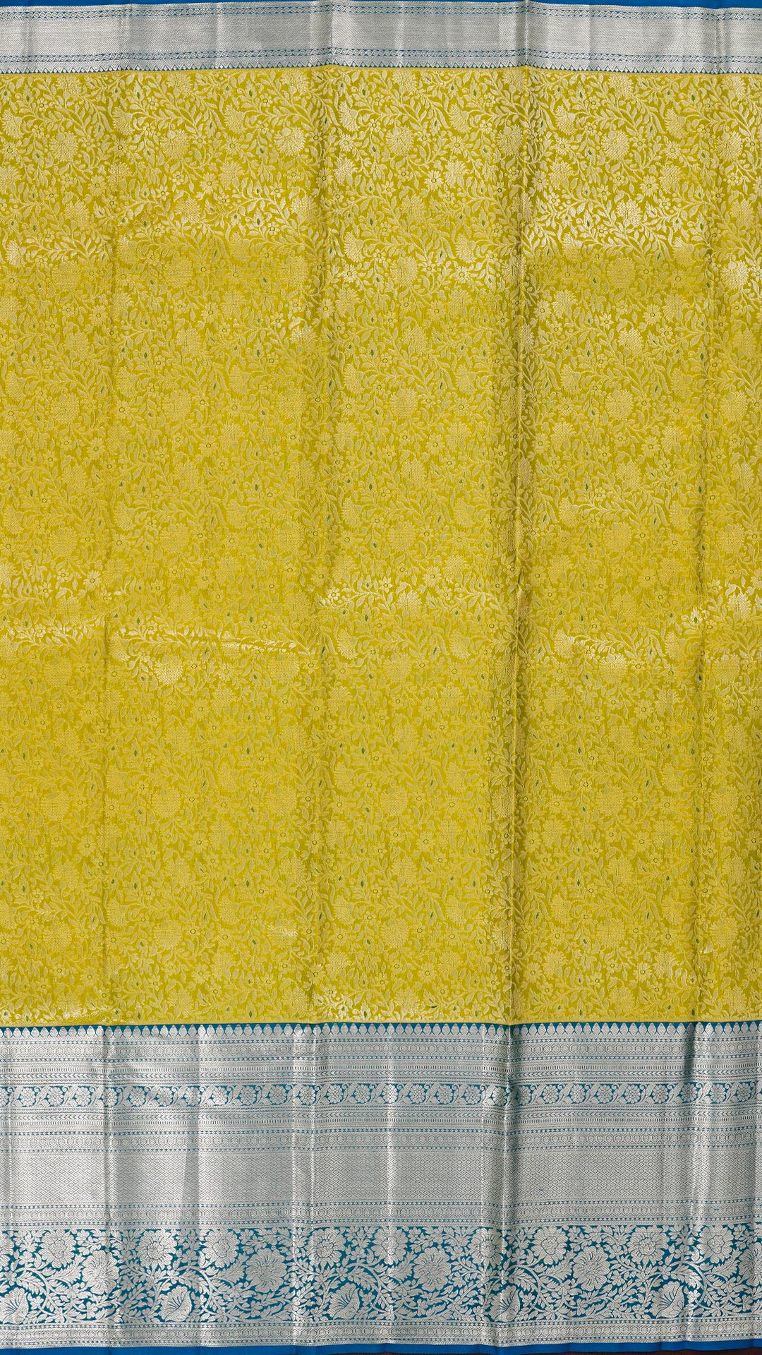 Yellowish Green Kanchipuram Saree with Silver Zari and Blue Contrast Border