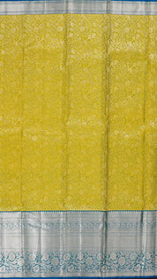 Yellowish Green Kanchipuram Saree with Silver Zari and Blue Contrast Border