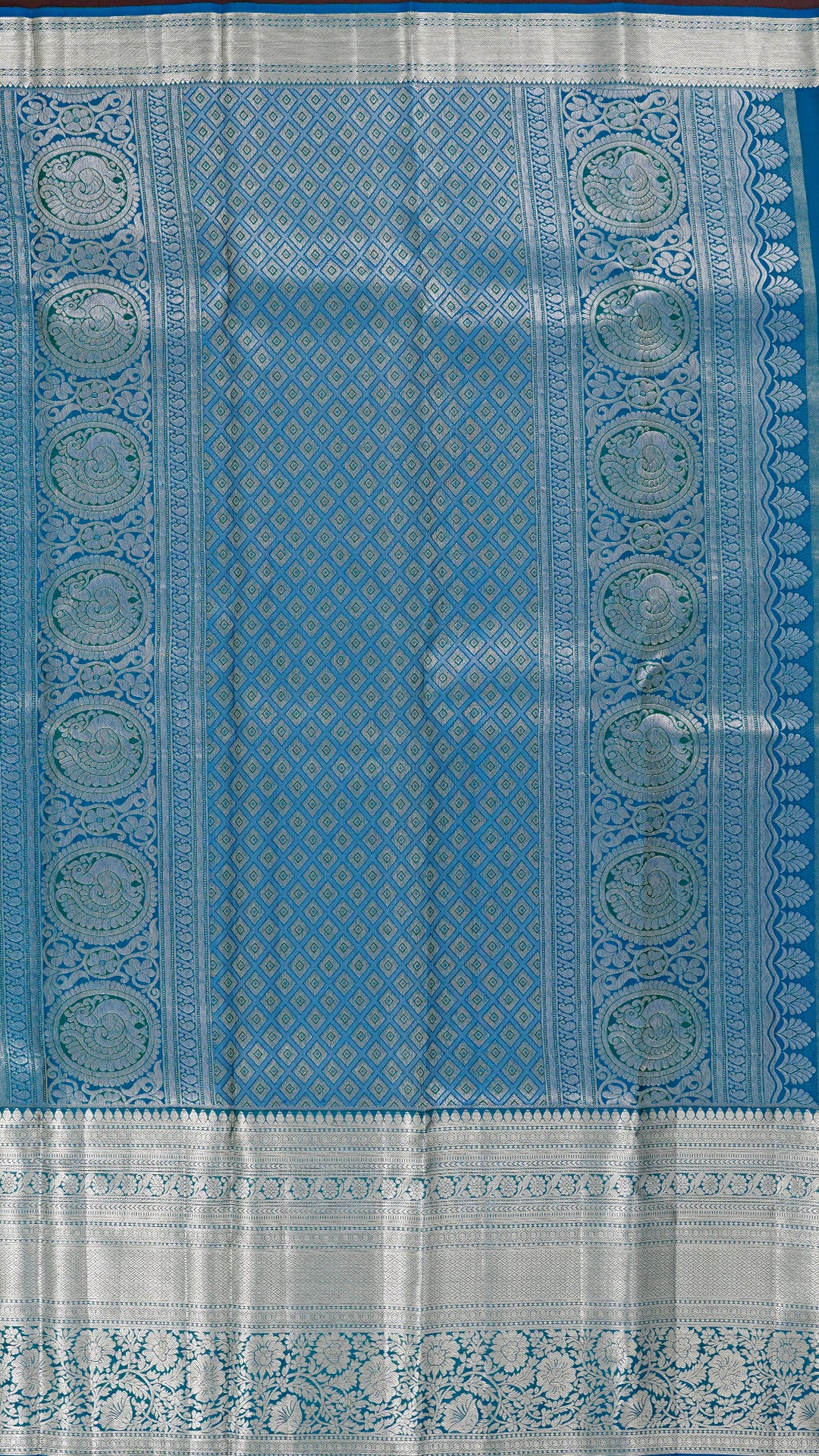 Yellowish Green Kanchipuram Saree with Silver Zari and Blue Contrast Border