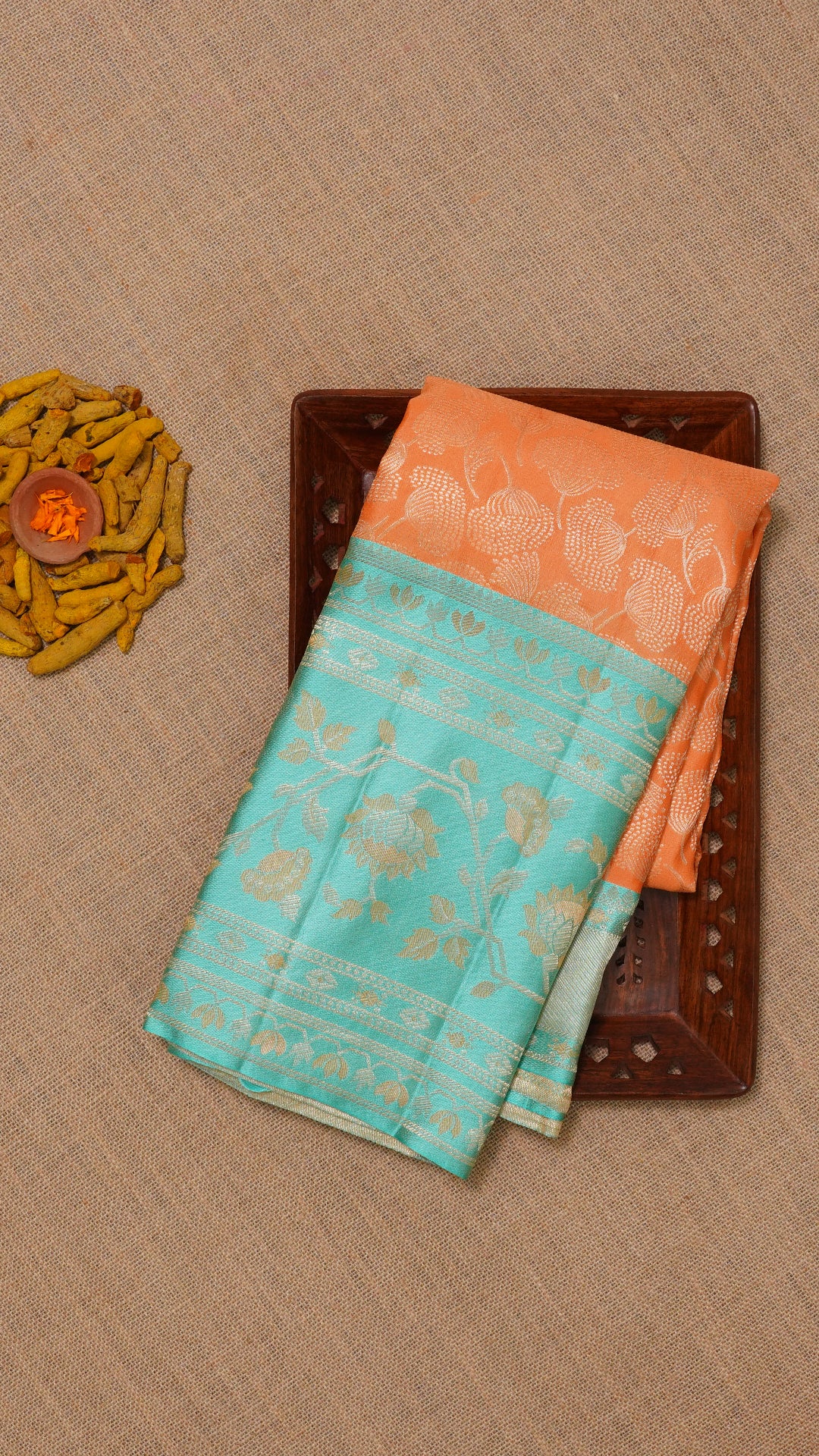 Peach Kanchi Pattu Saree with Blue Floral Zari Border