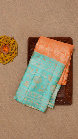 Peach Kanchi Pattu Saree with Blue Floral Zari Border