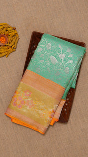 Powder Blue Kanchi Pattu Saree with Peach Zari Border