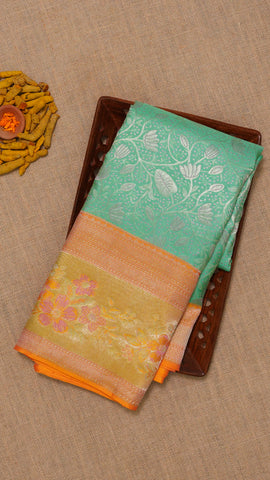 Powder Blue Kanchi Pattu Saree with Peach Zari Border