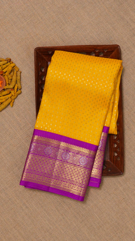 Yellow Kanchi Pattu Saree with Purple Zari Border