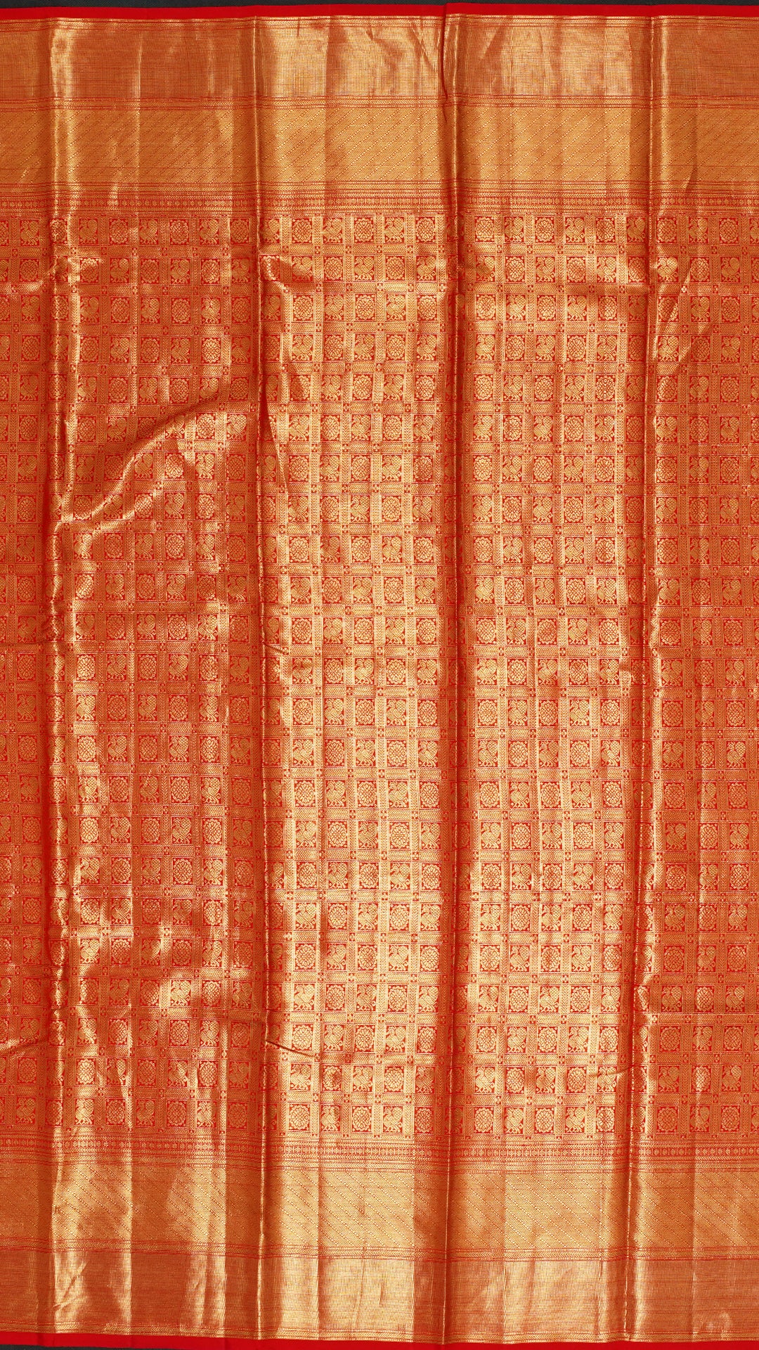 Orange Kanchi Pattu Saree with Rich Zari Border