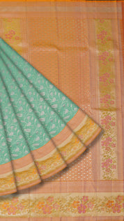 Powder Blue Kanchi Pattu Saree with Peach Zari Border