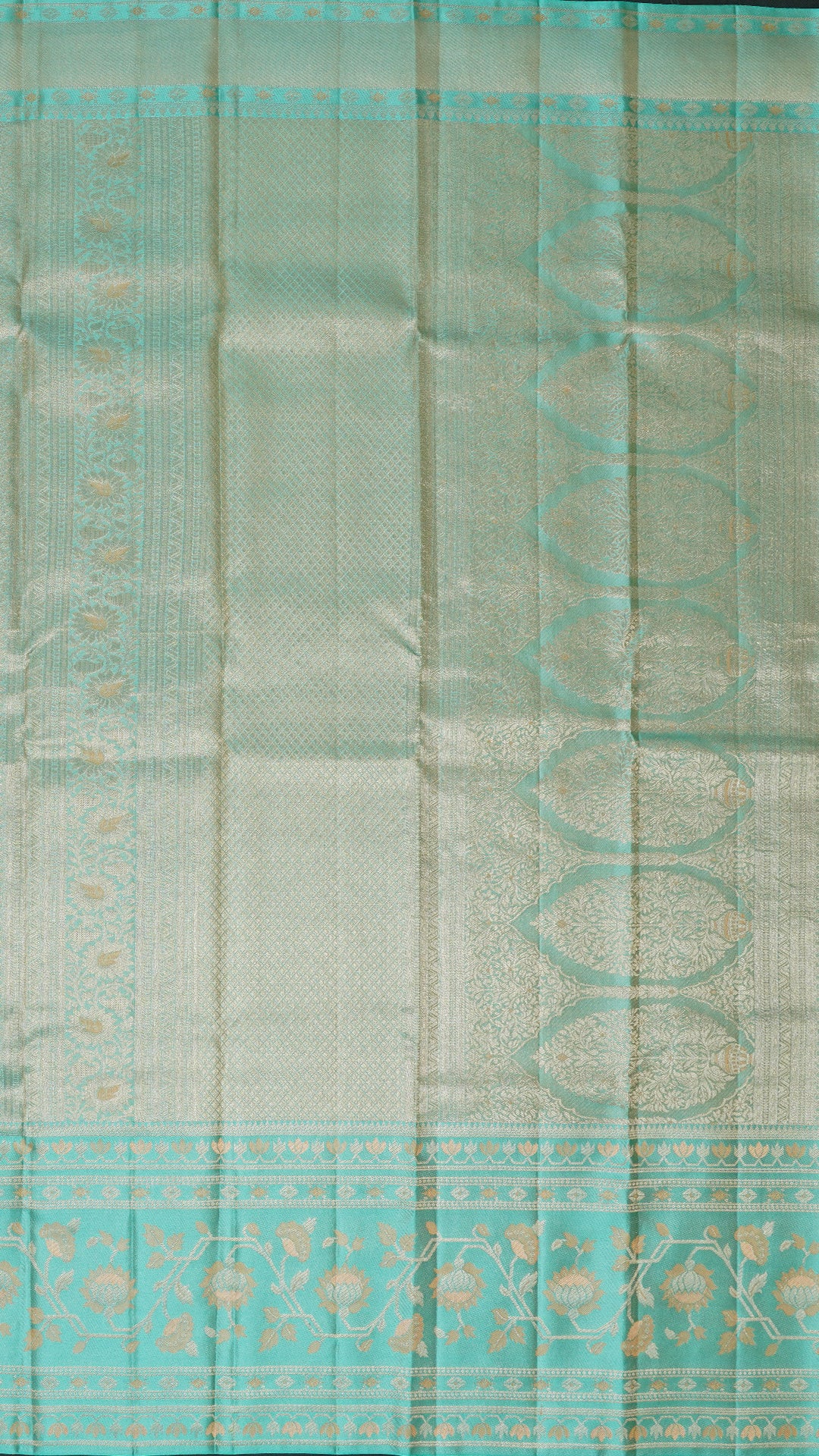 Peach Kanchi Pattu Saree with Blue Floral Zari Border