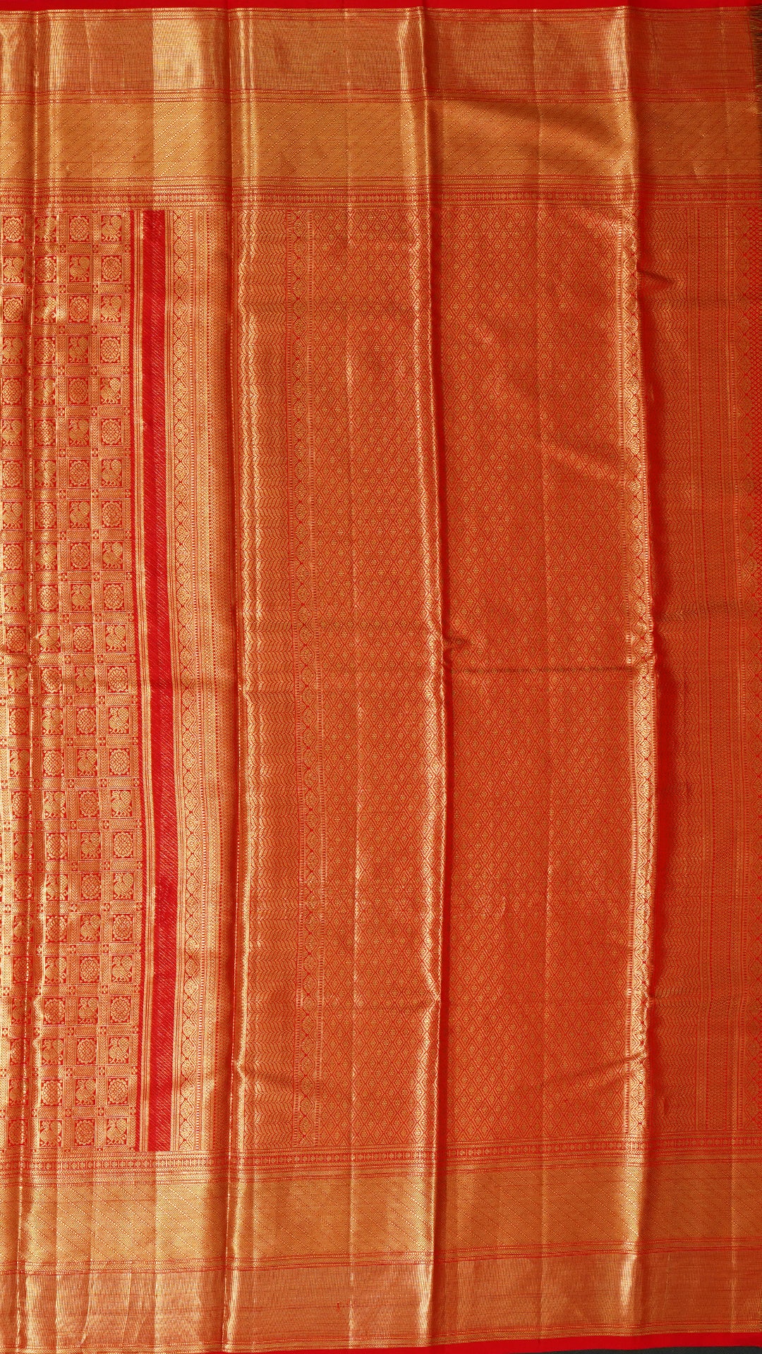 Orange Kanchi Pattu Saree with Rich Zari Border
