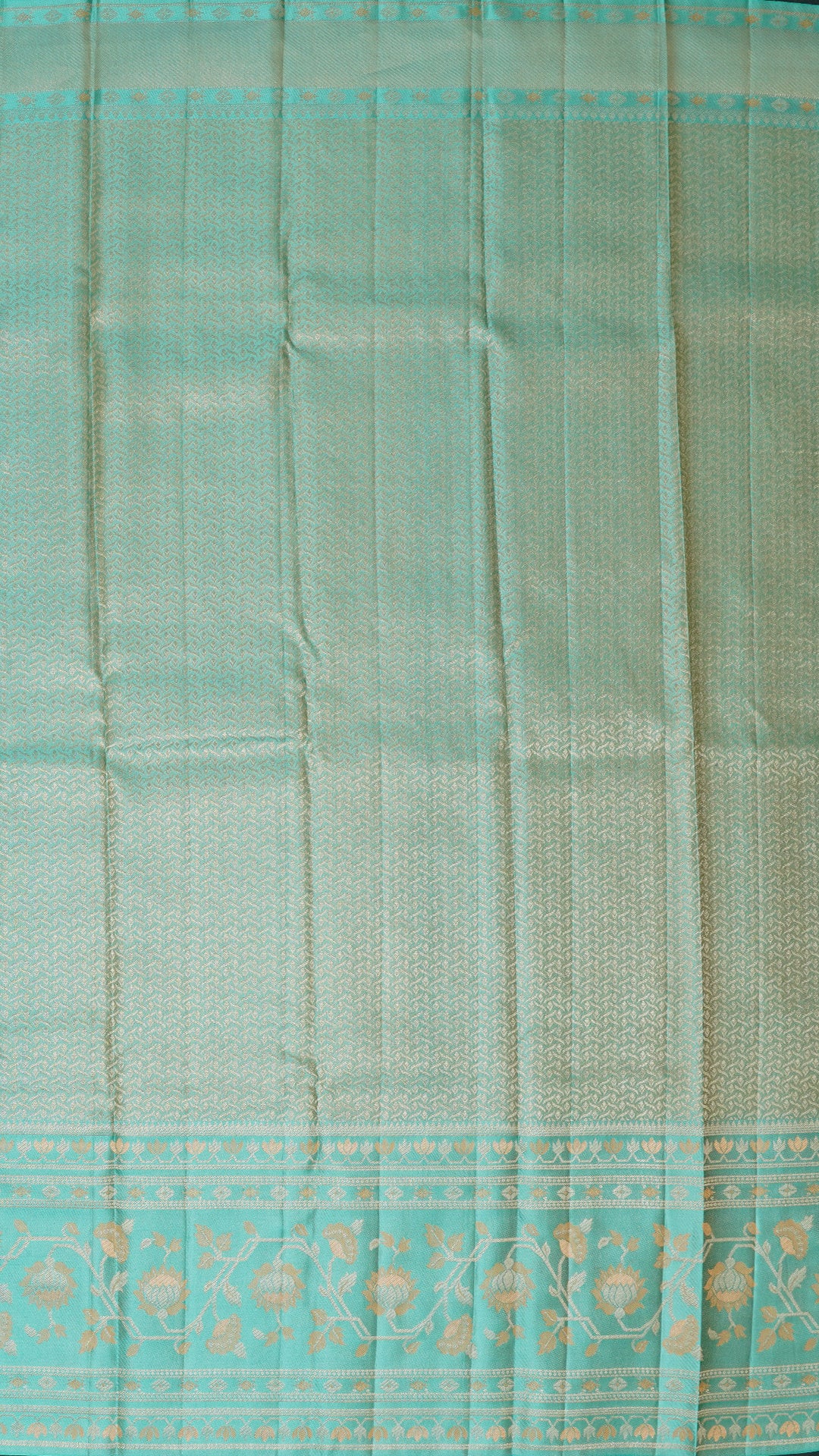 Peach Kanchi Pattu Saree with Blue Floral Zari Border