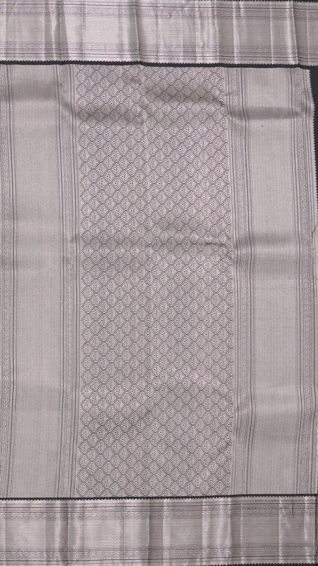 Black Kanchi Pattu Silk Saree with Medium Silver Self Zari Border