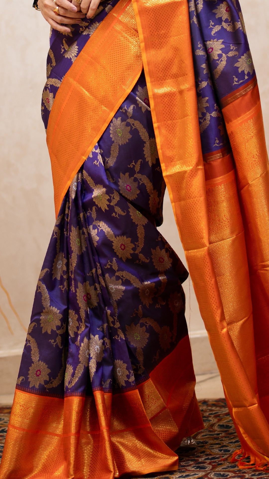 Navy Blue Kanchi Pattu Saree with Orange Zari Border