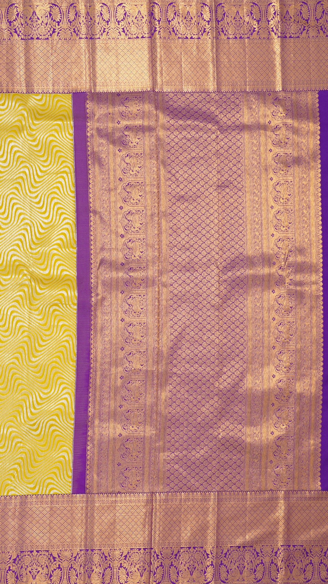Yellow Kanchi Pattu Silk Saree with Large Gold Contrast Zari Border and Wave Pattern -