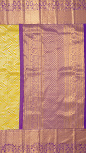 Yellow Kanchi Pattu Silk Saree with Large Gold Contrast Zari Border and Wave Pattern -