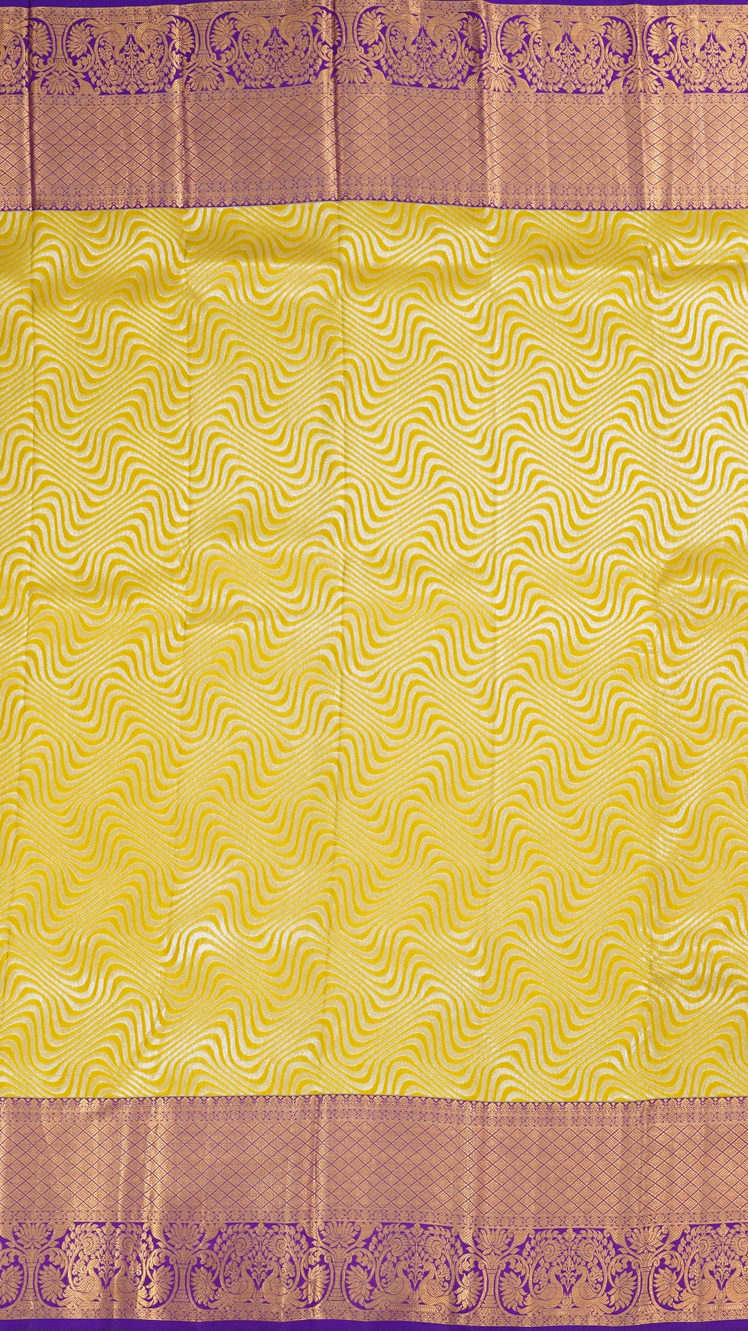 Yellow Kanchi Pattu Silk Saree with Large Gold Contrast Zari Border and Wave Pattern -