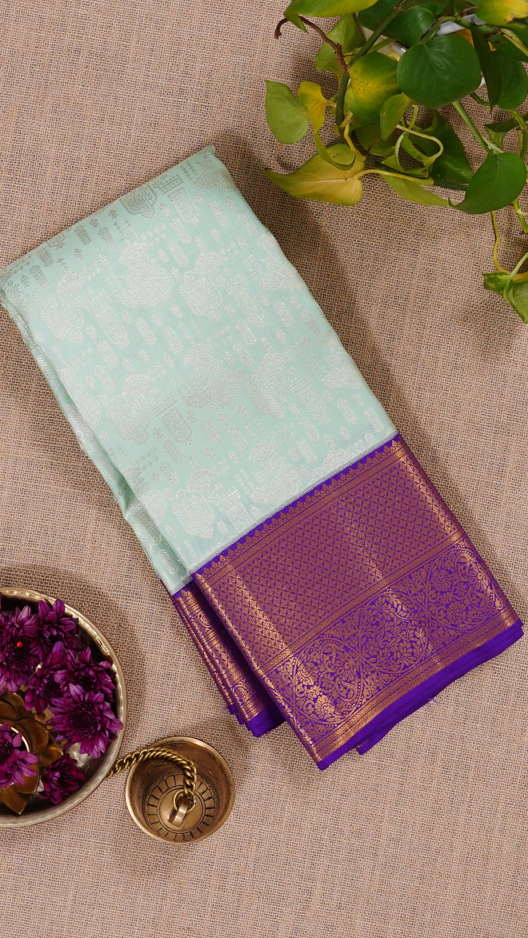 Light Blue Kanchipuram Silk Saree with Silver Butta and Purple Border