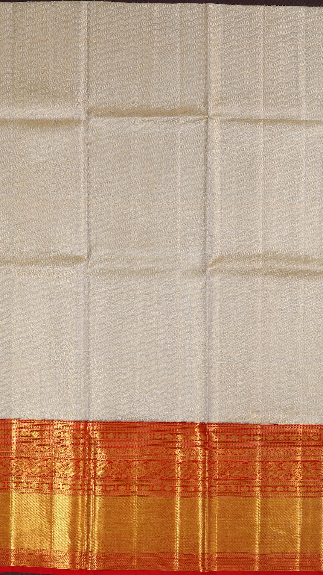 Festive Silk Pavada Featuring Laheraya Design in Cream with Gold