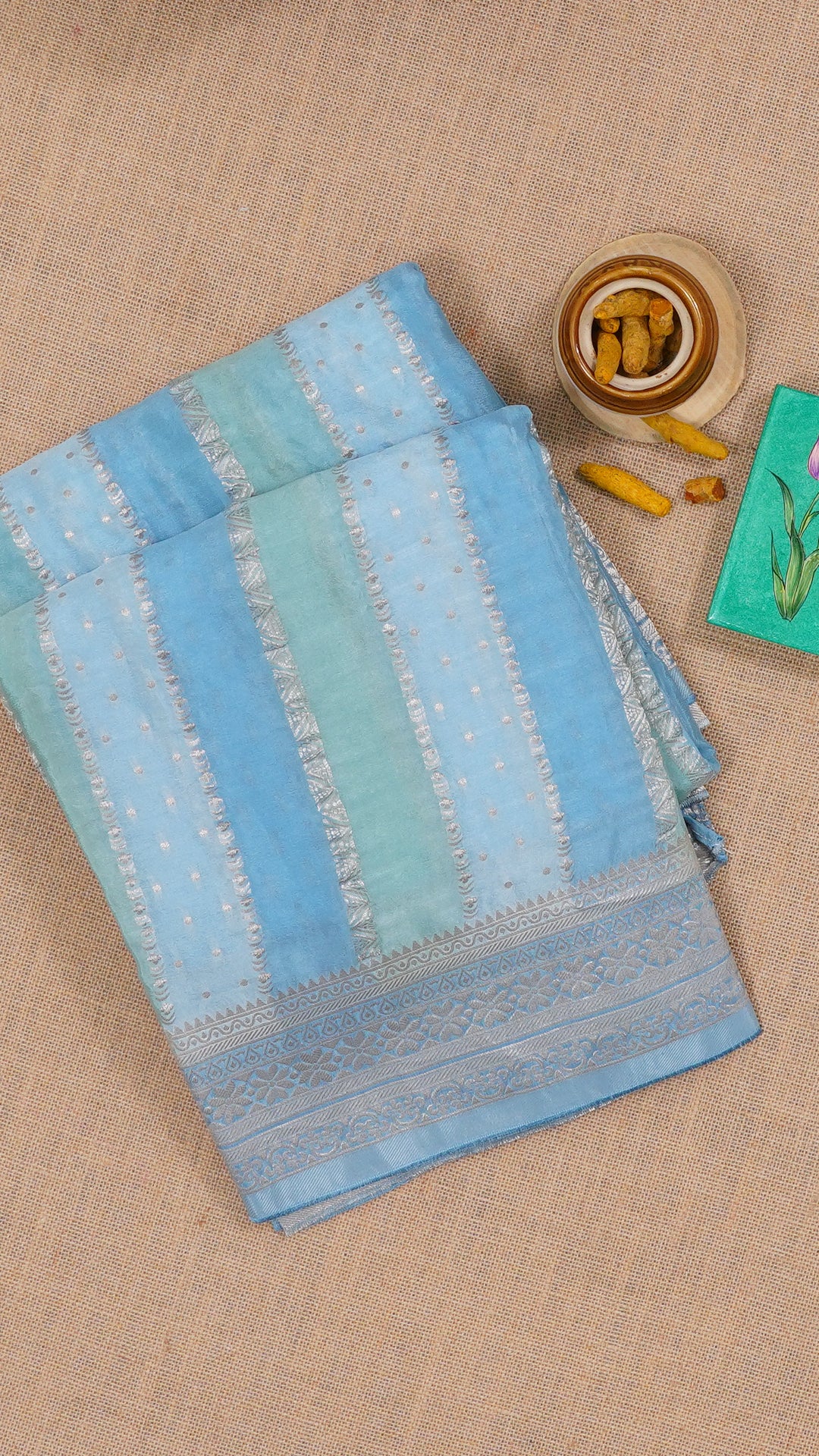 Sky Blue Crepe Silk Saree with Self Silver Border