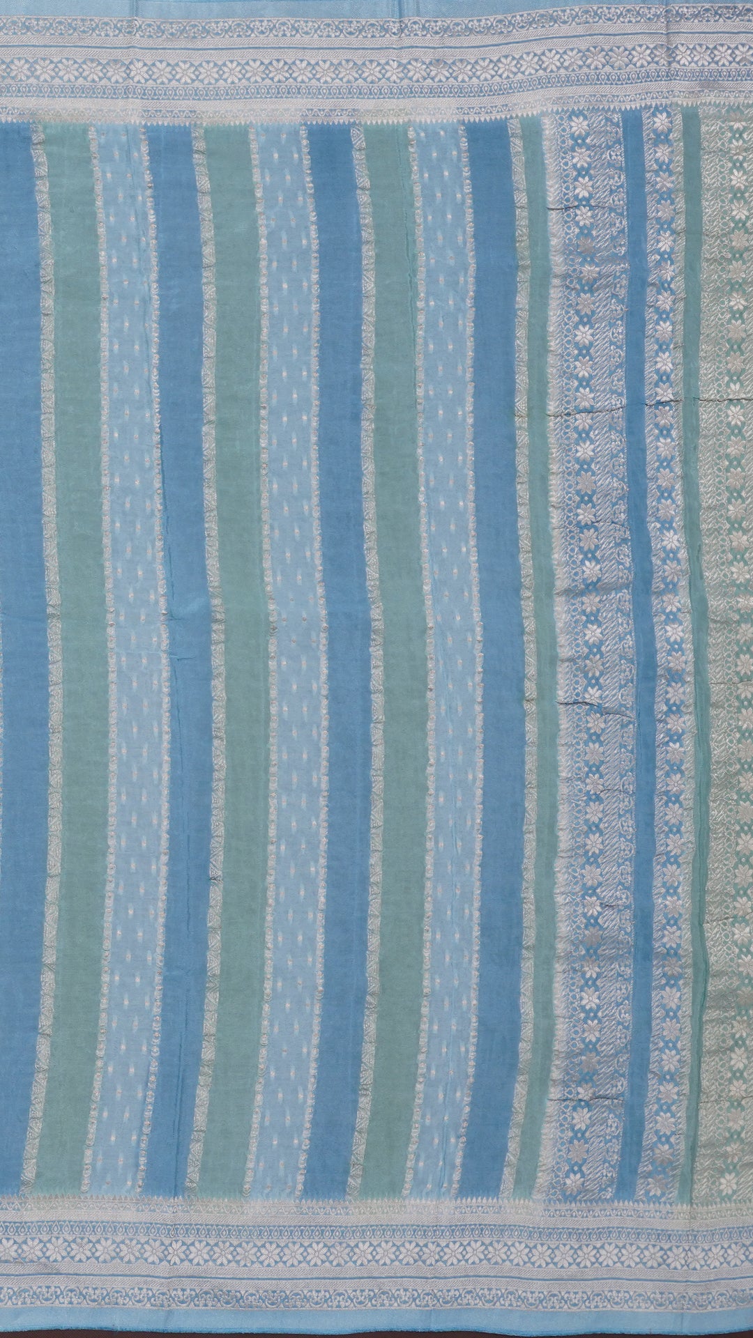 Sky Blue Crepe Silk Saree with Self Silver Border