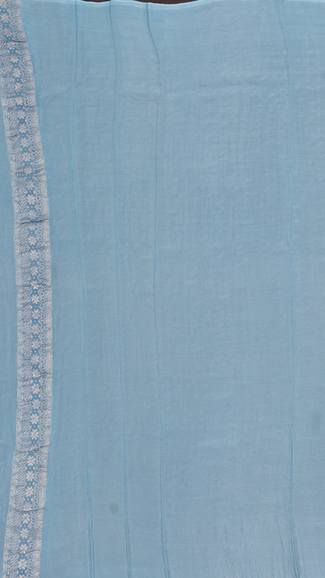 Sky Blue Crepe Silk Saree with Self Silver Border