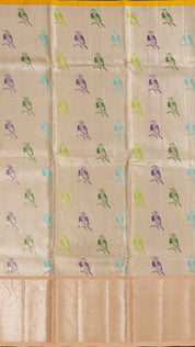 Golden Silk Pattu Pavada with Multi-Bird Motifs and Beige Border