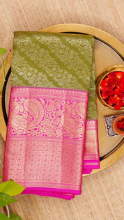 Mehendi Green Kanchipuram Silk Saree with All Over Silver Zari and Hot Pink Border