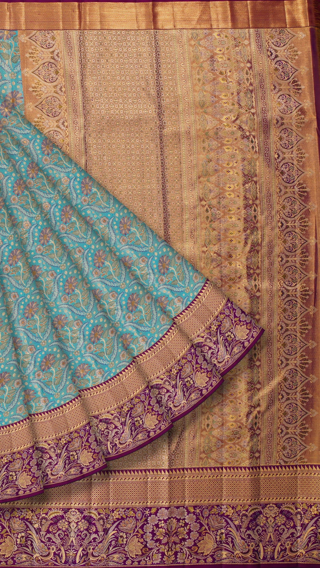 Aqua Blue Kanchi Pattu Saree with Purple Brocade Border
