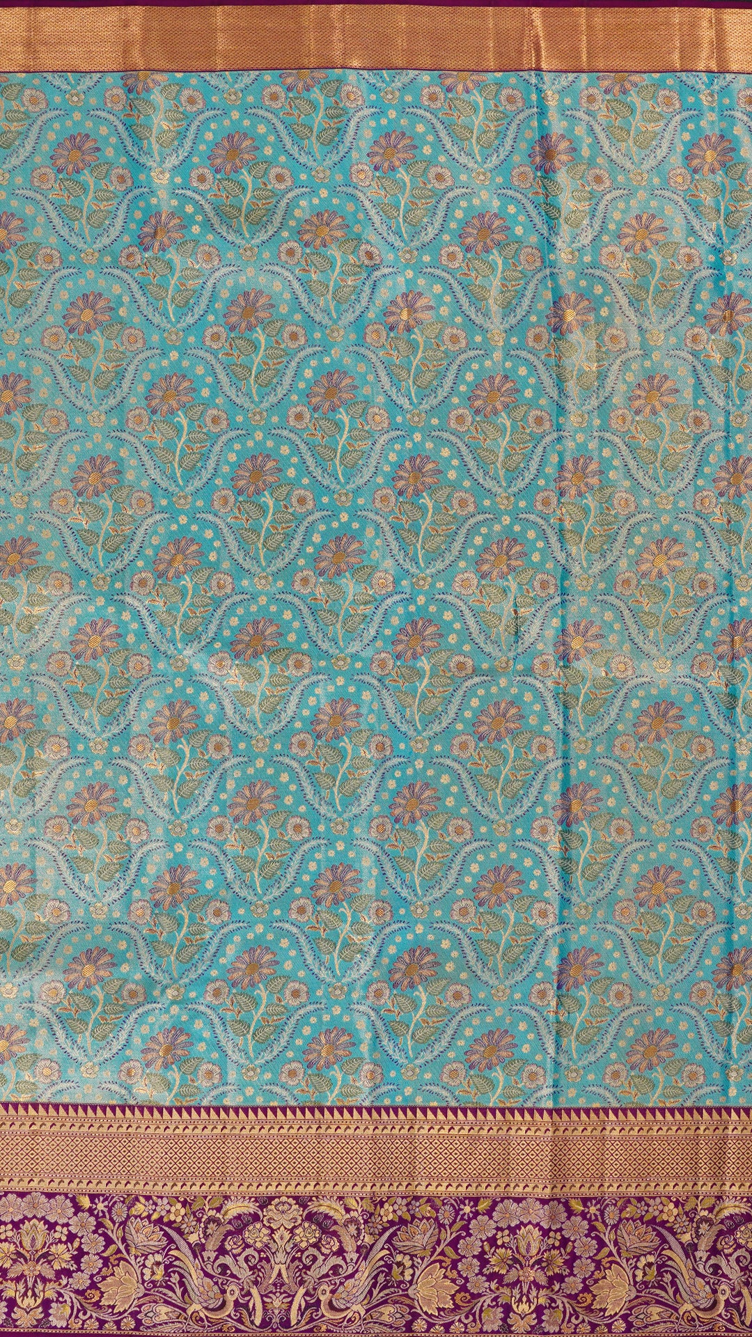 Aqua Blue Kanchi Pattu Saree with Purple Brocade Border