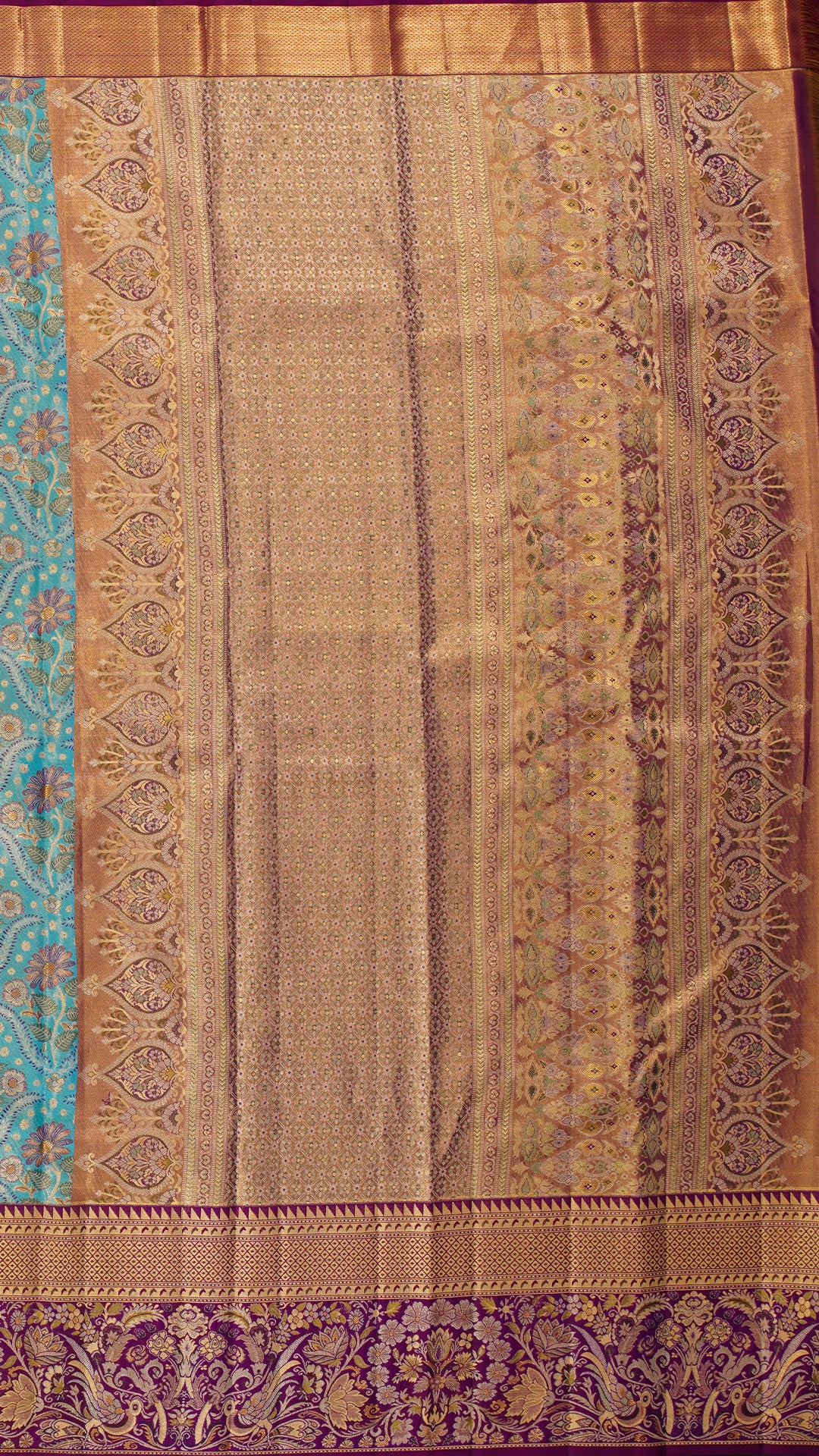 Aqua Blue Kanchi Pattu Saree with Purple Brocade Border