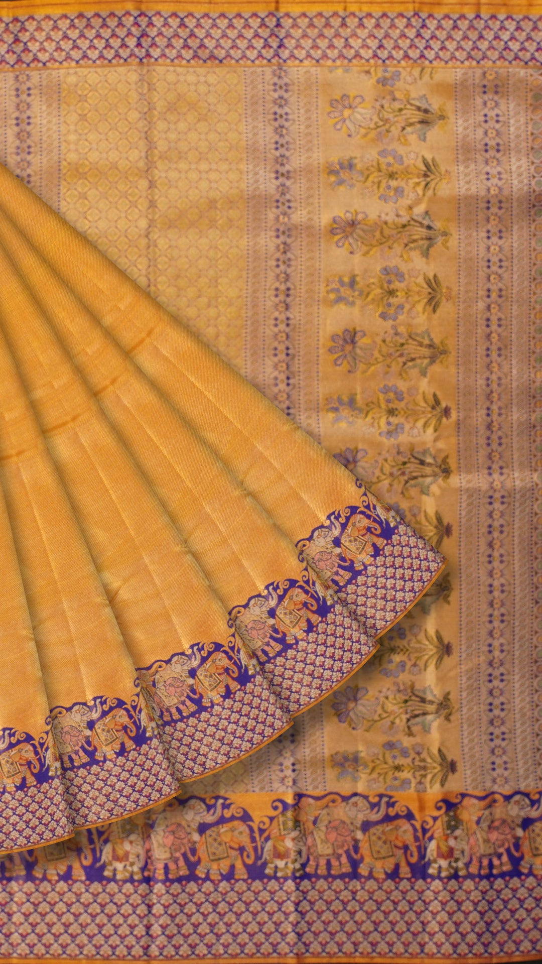 Golden Saree with Ink Blue Border and Elephant Design.