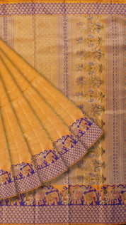 Golden Saree with Ink Blue Border and Elephant Design.