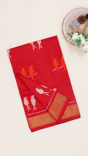 Bright Red Ikkat Silk Saree with Bold Buttas