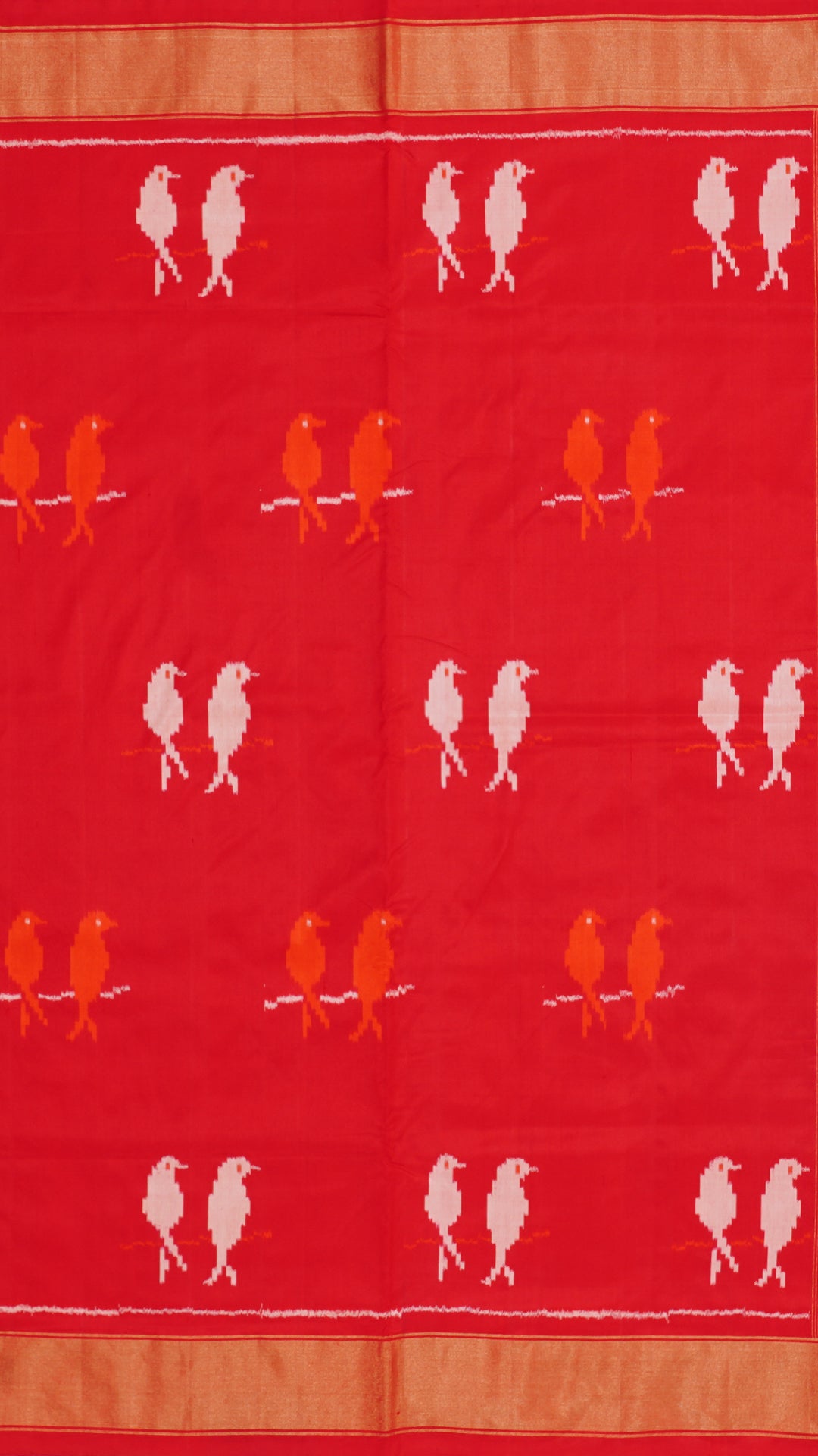 Bright Red Ikkat Silk Saree with Bold Buttas