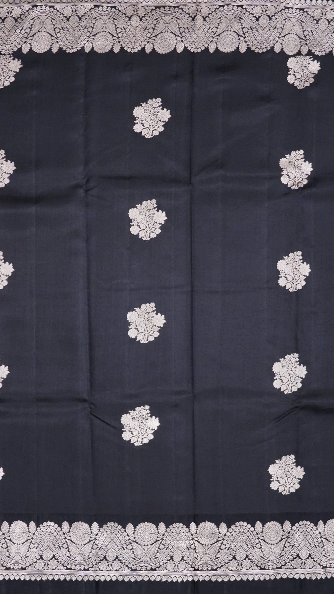 Black Raw Mango Silk Saree with Silver Buttas & Border